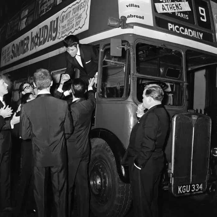 Framed Print : Cliff Richard and some of the Shadows with a hired London Transport bus Framed Print : Cliff Richard and some of the Shadows with a hired London Transport bus