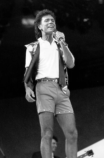 Cliff Richard singer and actor in concert on stage in Wembley. June 1989