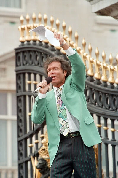 Cliff Richard singing for the crowds gathered at Buckingham Palace for World War II VE