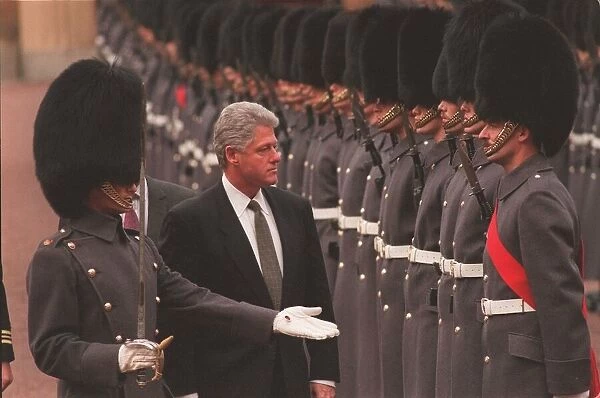 BILL CLINTON, US PRESIDENT, INSPECTING THE TROOPS AT BUCKINGHAM PALACE DURING HIS VISIT