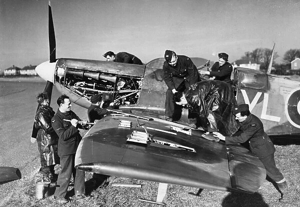 A clipped wing Spitfire of the Royal Air Force being serviced at a Fighter Command