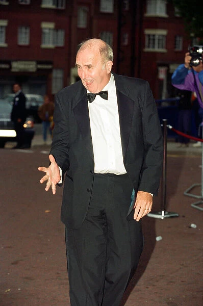 Clive James arriving at the National TV Awards. Wembley Arena, 29th August 1995