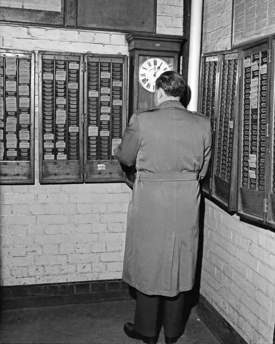 Framed Print : Clocking on at the Daily Herald newspaper offices. 18th December 1959 Framed Print : Clocking on at the Daily Herald newspaper offices. 18th December 1959