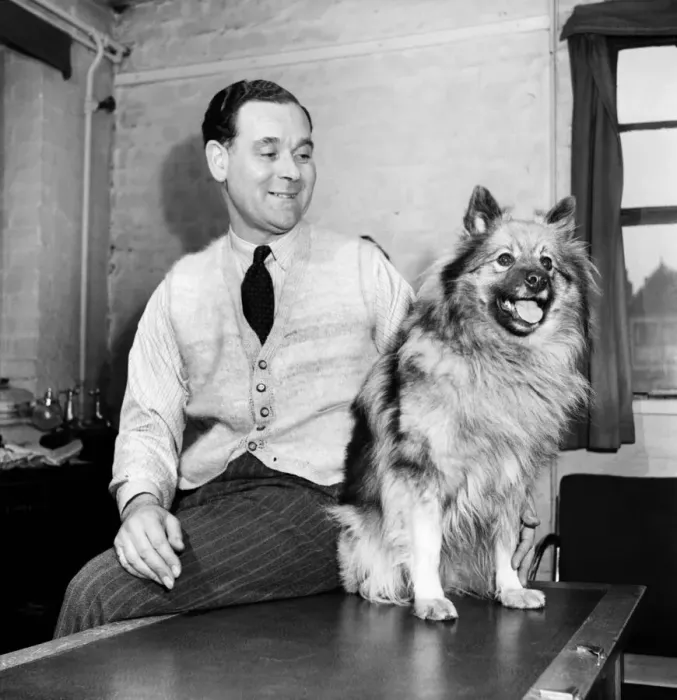 Framed Print : Clothes from dogs. Mr. Horne seen here modelling a waistcoat made from his dogs fur Framed Print : Clothes from dogs. Mr. Horne seen here modelling a waistcoat made from his dogs fur