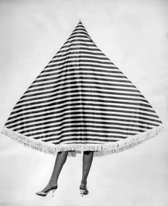 Framed Print : Clothing Beach 1963. Model Merril Weston wears a striped cape-tent