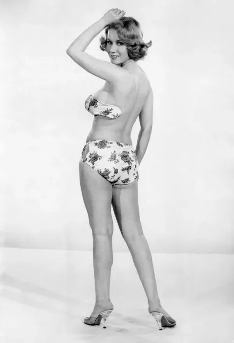 Framed Print : Clothing Beach. Backless floral bikini. July 1960 P018088 Framed Print : Clothing Beach. Backless floral bikini. July 1960 P018088