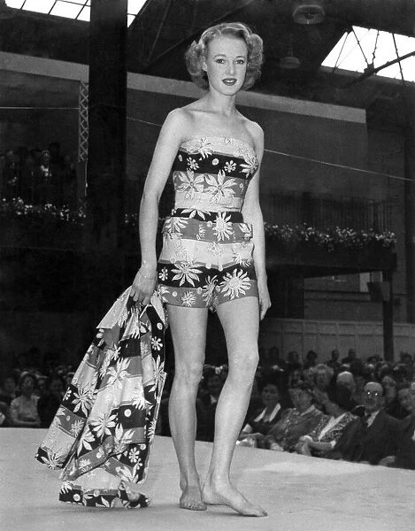 Clothing Beach: A cotton printed play suit being shown on stage catwalk at a fashion show