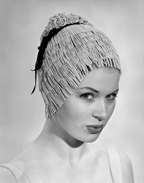 Clothing Beach: Fringe Tiered. This cap is made of tiers of fringe