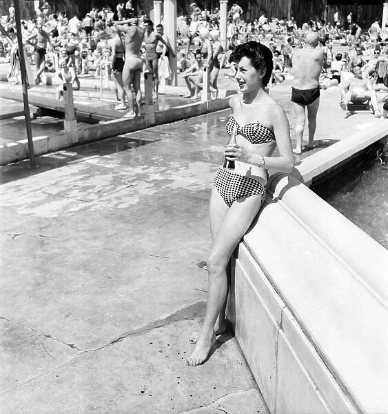 Clothing Beachwear. Jase Mills modelling bikini. July 1953 D3467