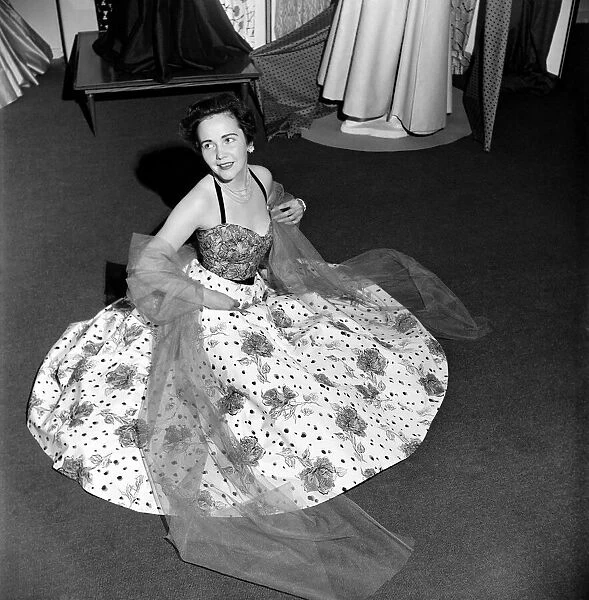 Clothing exhibition of fashion in Cotton 1953. Miss Nancy Bevan displaying a rose printed