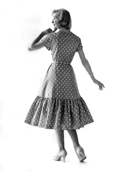 Framed Print : Clothing Fashion 1958. Audry Wayne modelling a pattern dress with frill skirt Framed Print : Clothing Fashion 1958. Audry Wayne modelling a pattern dress with frill skirt