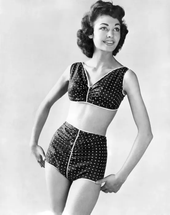 Framed Print : Clothing Fashion 1958. Model wearing a two piece polka dot swimming costume Framed Print : Clothing Fashion 1958. Model wearing a two piece polka dot swimming costume