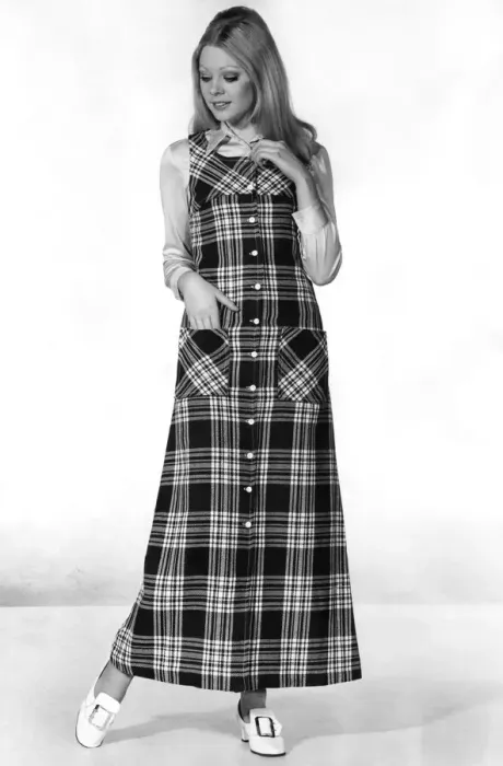 Framed Print : Clothing Fashion 1970: Cross Check Little girl look for a plaid pinafore