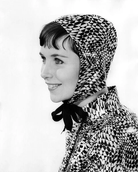 Clothing. Fashion. Ann Cave. Fetching bonnet-type headwear tied with a ribbon