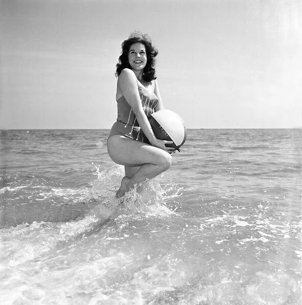 Clothing: Fashion: Beachwear: Boobie Hills models latest swimming costumes. 1965 E407-013
