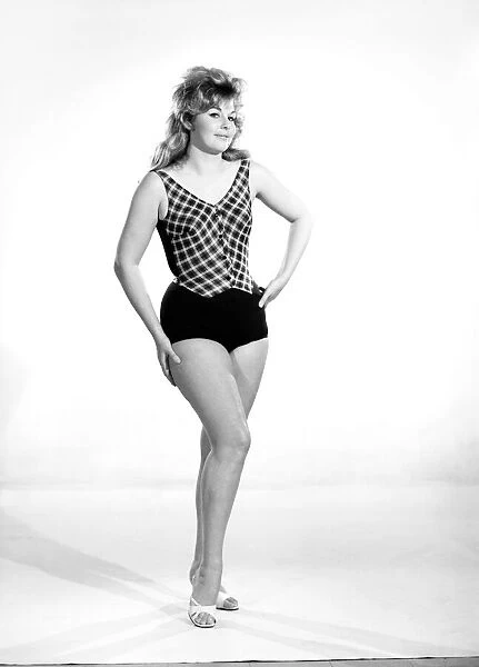 Clothing: Fashion: Beachwear: Hazel Sutton modelling swimming costumes. 1965 B1724-004