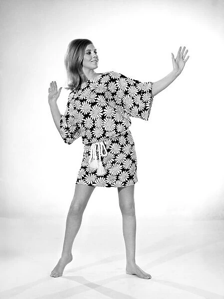 Clothing: Fashion: Beachwear: Maureen Weaver modelling beach dress. 1965