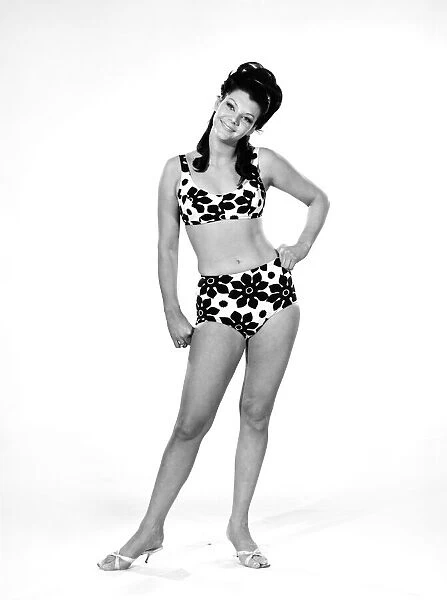 Clothing: Fashion: Beachwear: Woman wearing swimming costume. Model: Jo Anne Asher