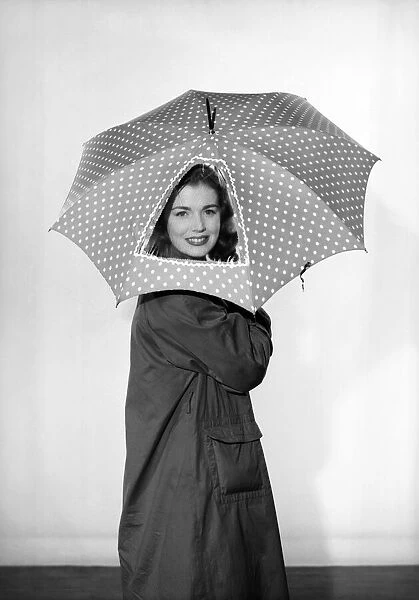 Clothing: Fashion: Coats: Woman wearing rain coat and clear panel umbrella