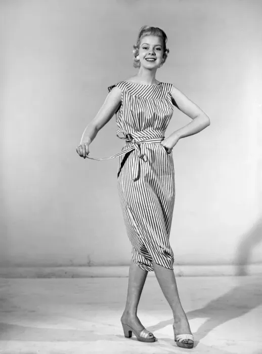 Framed Print : Clothing: Fashion: Dresses: Woman wearing reversible dress. 1957 B303-001