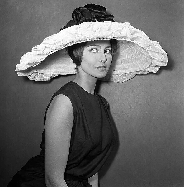 Clothing Fashion Hats January 1964 A huge broderie Anglais brimmed hat with