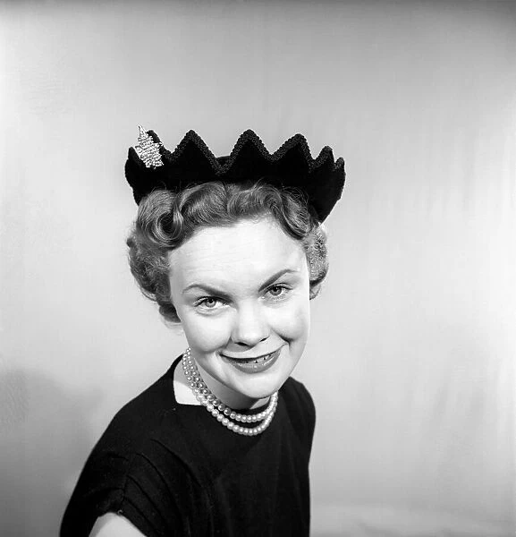 Clothing: Fashion: Hats: Woman wearing crown hat. 1958 B118