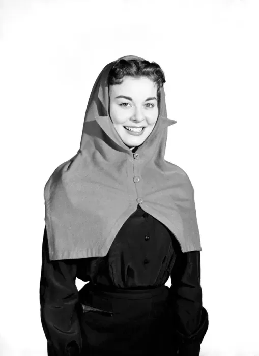 Framed Print : Clothing: Fashion: Hats: Woman wearing hat and scarf combined. 1958 B427-002