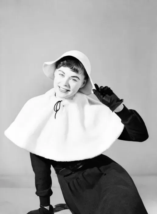 Framed Print : Clothing: Fashion: Hats: Woman wearing matching cape and hat. 1957 B261 Framed Print : Clothing: Fashion: Hats: Woman wearing matching cape and hat. 1957 B261