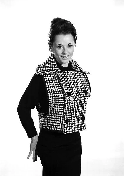 Clothing: Fashion: Jacket: Woman wearing check jacket. Model: Barbara Parry