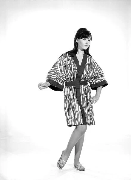 Clothing: Fashion: Kimono: Model: Rosemary Bell. 1966 B2049-007