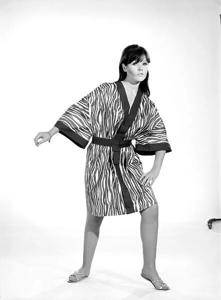 Clothing: Fashion: Kimono: Model: Rosemary Bell. 1966 B2049-002
