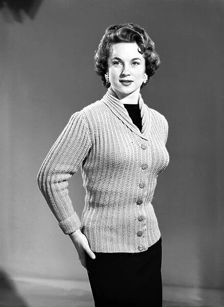 Clothing: Fashion: Knitwear: Model wearing jumper. 1955 B254-002