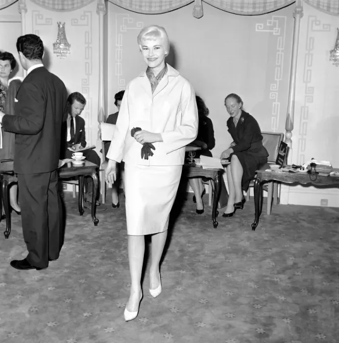 Framed Print : Clothing: Fashion: Leather. Woman modelling leather coats at fashion show