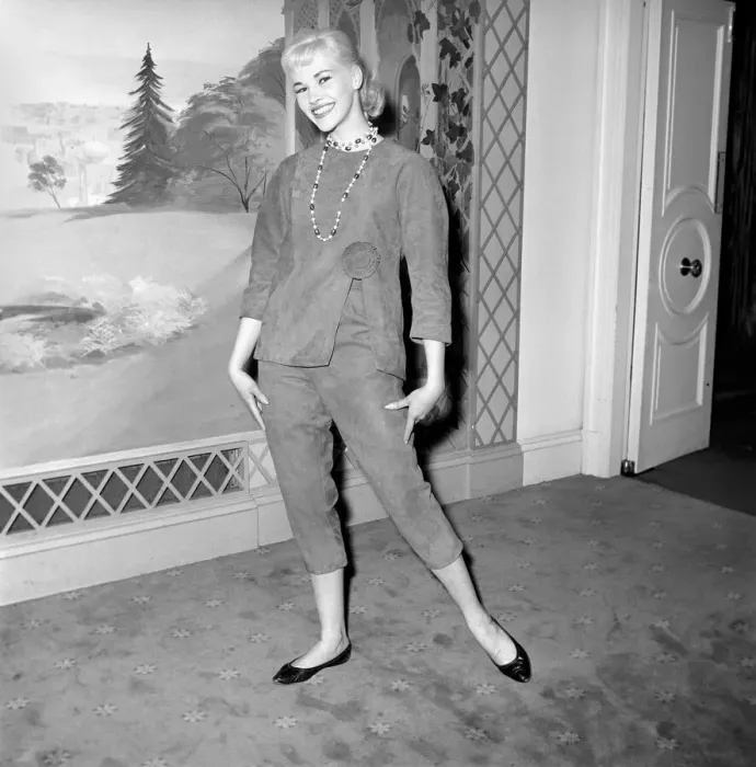 Framed Print : Clothing: Fashion: Leather. Woman modelling leather coats at fashion show