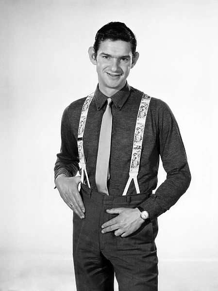 Clothing: Fashion: Menswear: Man wearing braces. 1966 B2029-004