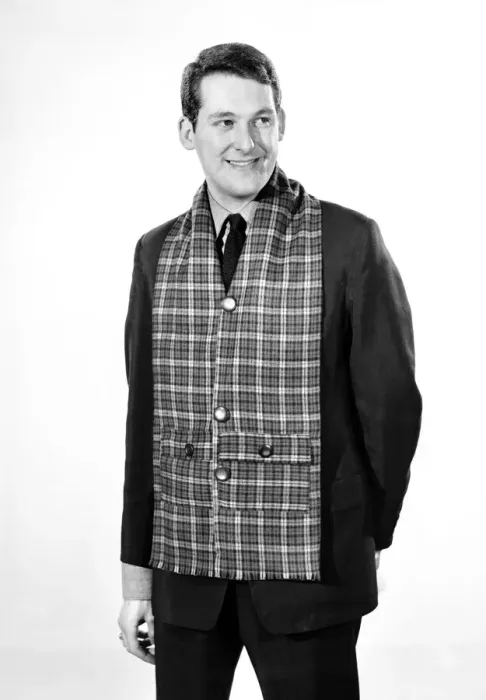Framed Print : Clothing: Fashion: Menswear: Man wearing tartan muffler. Model: Michael Lester