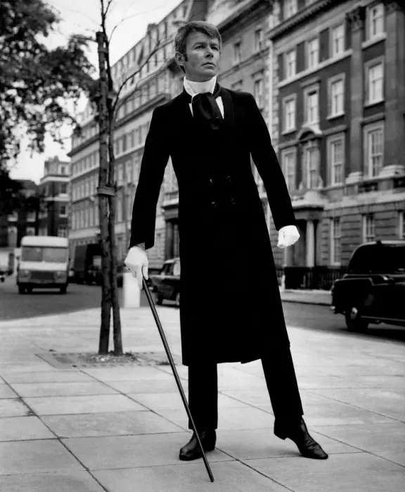 Framed Print : Clothing: Fashion Menswear. Ralph wearing a Black Trevira Maxi Coat and trousers