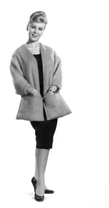 Framed Print : Clothing Fashion: Rita Royce modelling a Fine and Furry fur jacket over a black cocktail Framed Print : Clothing Fashion: Rita Royce modelling a Fine and Furry fur jacket over a black cocktail