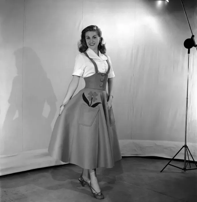 Framed Print : Clothing: Fashion: Skirts model wearing felt skirt. October 1953 D5999-001 Framed Print : Clothing: Fashion: Skirts model wearing felt skirt. October 1953 D5999-001