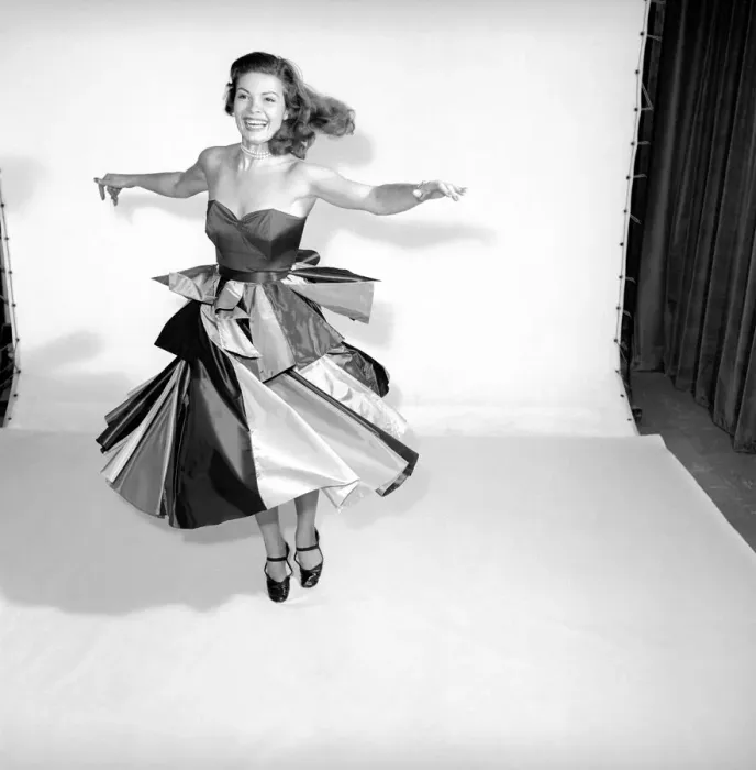 Framed Print : Clothing: Fashion: Skirts: Woman wearing flying panel dress. Model: Pat Owens
