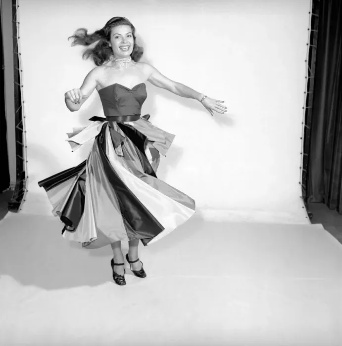 Framed Print : Clothing: Fashion: Skirts: Woman wearing flying panel dress. Model: Pat Owens. 1956 B259 Framed Print : Clothing: Fashion: Skirts: Woman wearing flying panel dress. Model: Pat Owens. 1956 B259