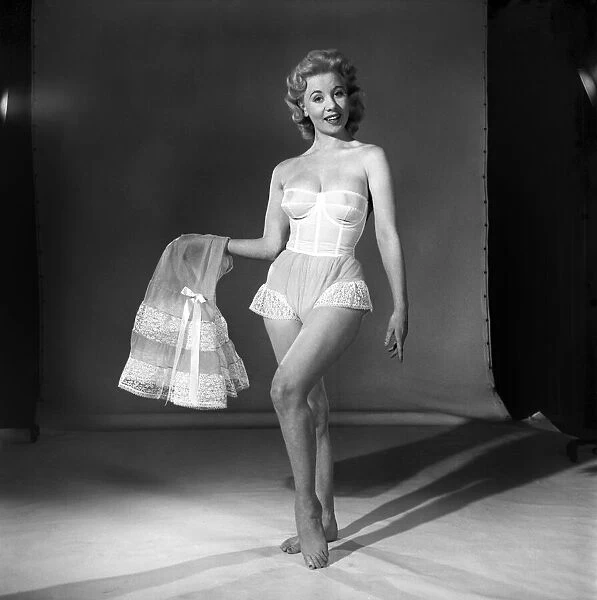 Clothing: Fashion: Underwear: Woman wearing corsett and petticoat. Model: Shane Condell
