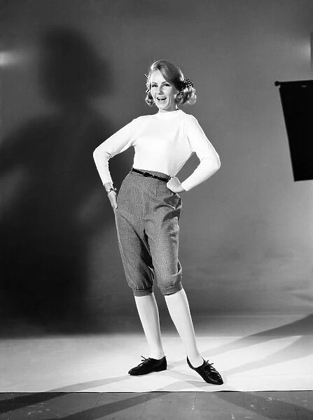 Clothing: Fashion: Woman wearing plus fours. Model: Marie Louise. January 1963 B1546-003