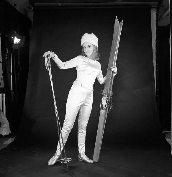 Clothing: Fashion: Woman wearing skiing outfit converted from wedding dress. 1963 B1578a