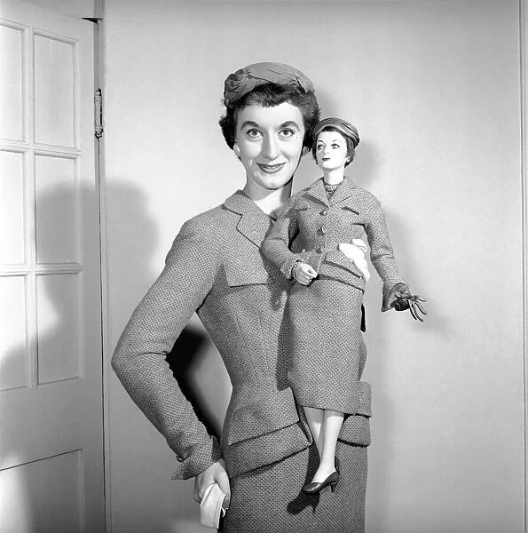 Clothing Fashions 1954: Mannequin modelling the latest twin set. 1954 A107-005