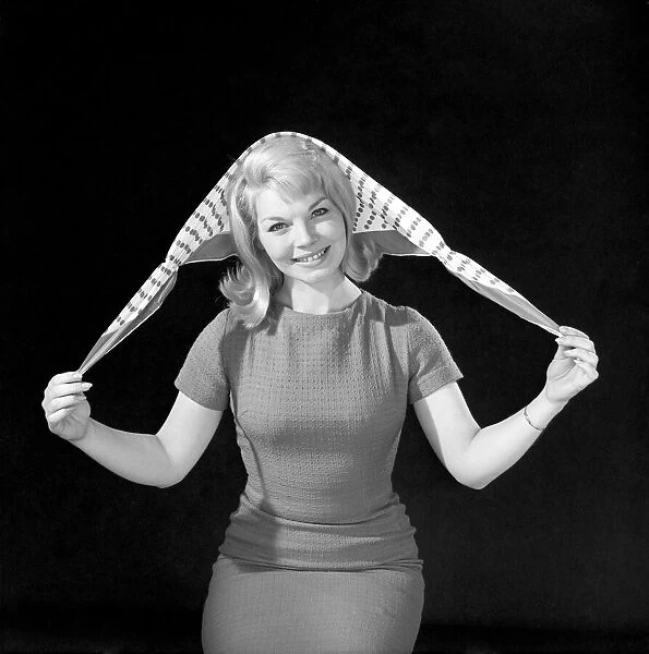 Clothing: Fashions: Headscarf: Woman (Marion Horton) wearing headscarf. 1966