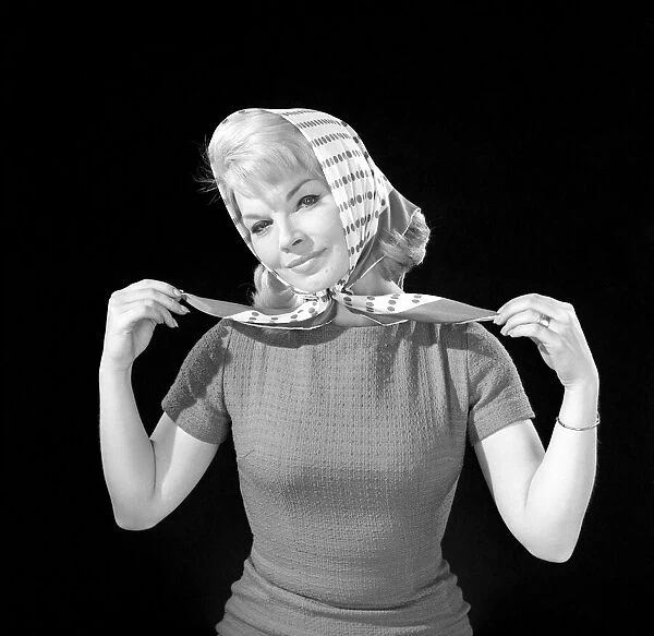 Clothing: Fashions: Headscarf: Woman (Marion Horton) wearing headscarf. 1966 B1915-010