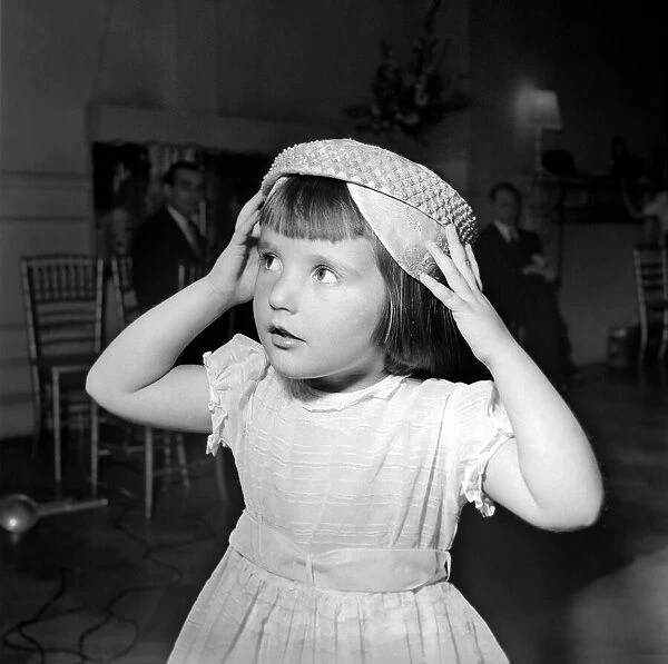 Clothing Hat Fashion: Child wearing a hat. July 1953 D3883