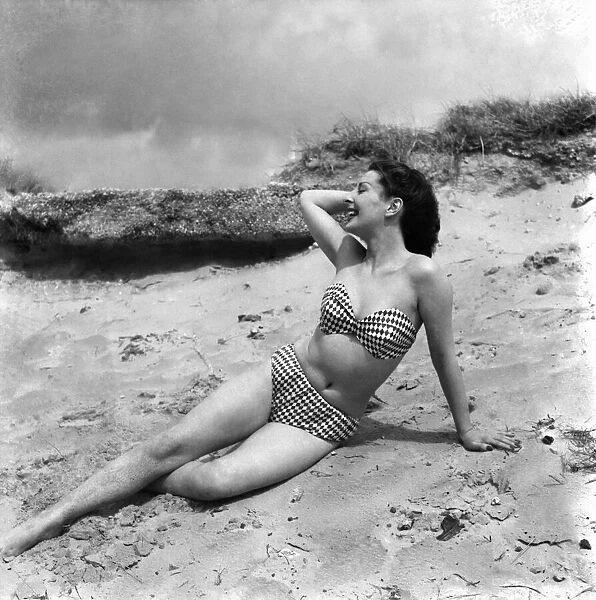 Clothing holiday fashions 1953 Model. Audrey hodgelass seen here modelling a bikini