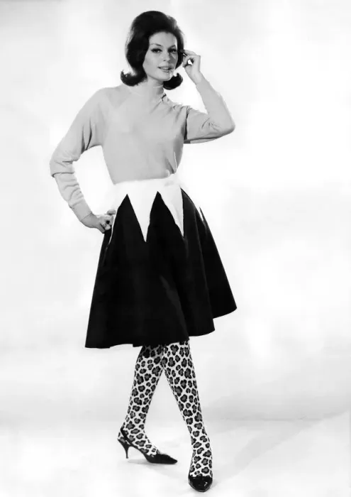 Framed Print : Clothing Misc. 1965: Gloria James modelling sweater, two tone skirt with animal print Framed Print : Clothing Misc. 1965: Gloria James modelling sweater, two tone skirt with animal print